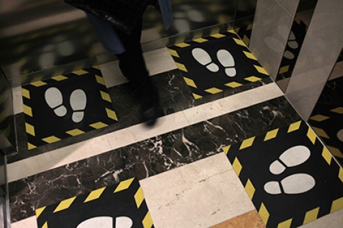 Marking on the floor to help people social distance